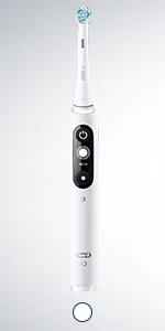 Oral-B iO electric toothbrush, showcasing the interactive display and sleek, white design.