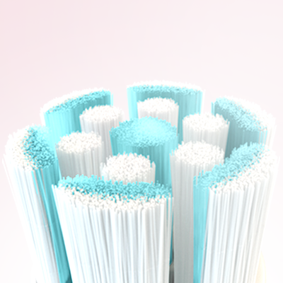 Oral-B toothbrush head featuring blue and white bristles for cleaning and polishing teeth.