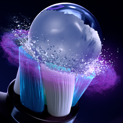 Oral-B toothbrush bristles shown in a macro view with blue and purple lighting to highlight cleaning technology.