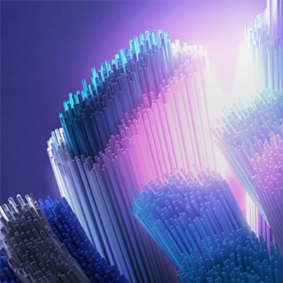 Oral-B toothbrush head bristles shown in a close-up, abstract view, highlighting bristle density and design.