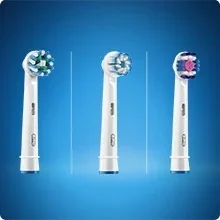 Three different Oral-B electric toothbrush heads are shown side by side.