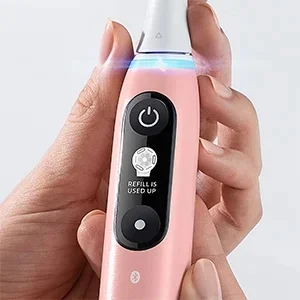 Oral-B iO toothbrush showing the display indicating