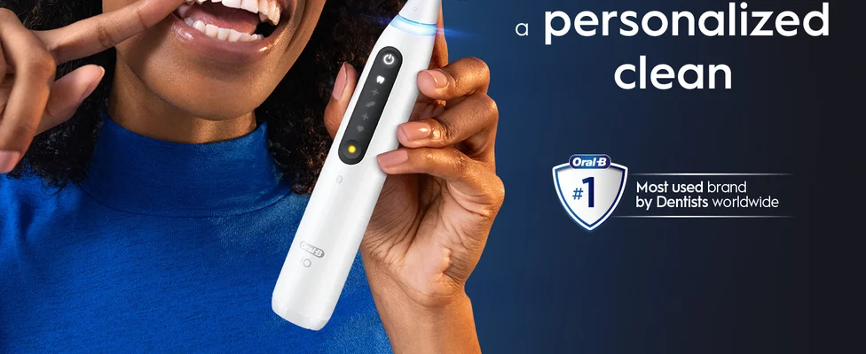 Smiling person with Oral-B toothbrush featuring "personalized clean" text and #1 brand claim