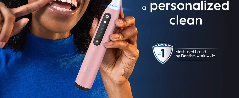 Smiling person with Oral-B toothbrush featuring "personalized clean" text and #1 brand claim