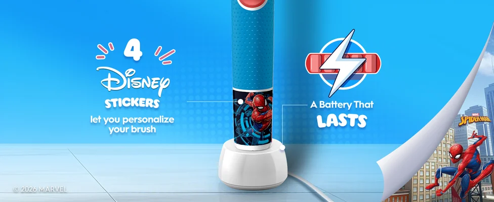 Base of Oral-B Spider-Man toothbrush on a charger. Icons show: “4 Disney Stickers” for personalization and “A Battery That Lasts.” Spiderman graphic in the corner.