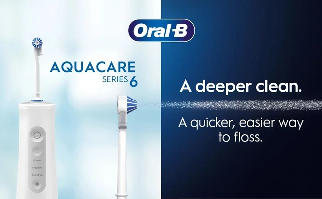 Image shows an Oral-B Aquacare Series 6 water flosser and text Oral-B AQUACARE SERIES 6 A deeper clean. A quicker, easier way to floss.