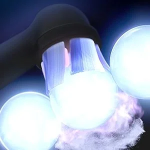 Oral-B toothbrush head with illuminated bristles and cleaning foam, highlighting its cleaning power.