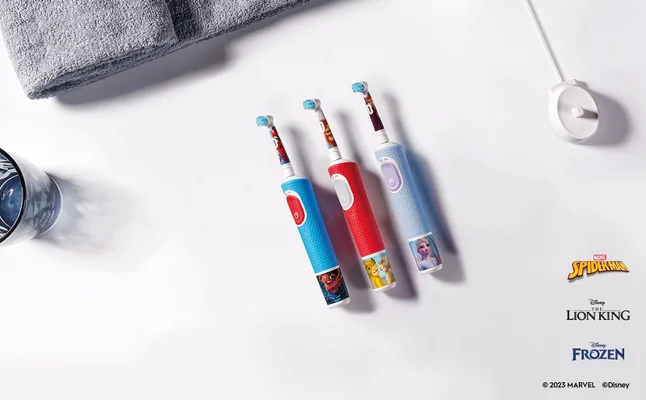 Oral-B electric toothbrushes featuring Marvel Spider-Man, Disney Lion King, and Disney Frozen characters.