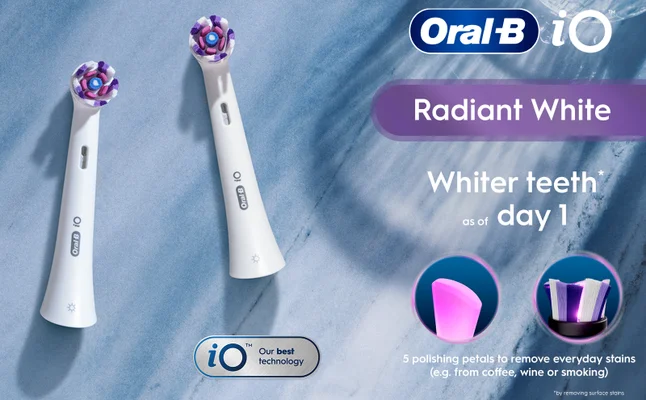 Two Oral-B iO Radiant White brush heads with polishing petals to remove stains.
