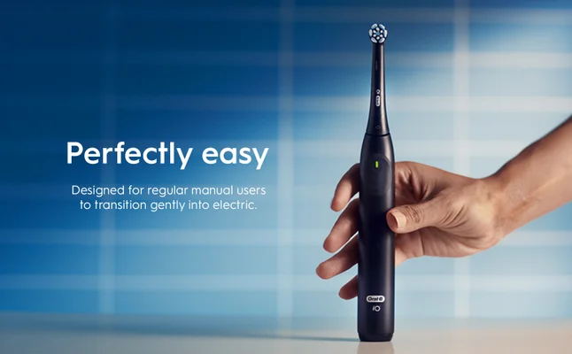Oral-B iO2 electric toothbrush, emphasizing its ease of use and quiet operation.
