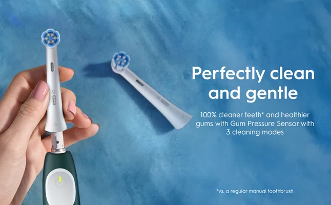 Oral-B iO2 electric toothbrush, highlighting its ability to provide 100% cleaner teeth compared to a regular manual toothbrush.