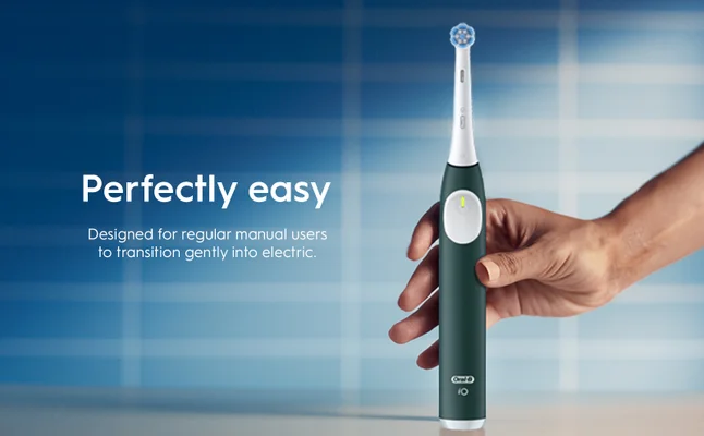 Oral-B iO2 electric toothbrush, emphasizing its ease of use and quiet operation.