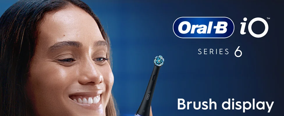 An Oral-B iO Series 6 electric toothbrush with the brush display feature on a blue background.