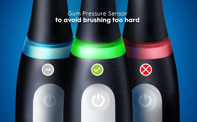 Toothbrushes indicating pressure: low (blue), correct (green), high (red).