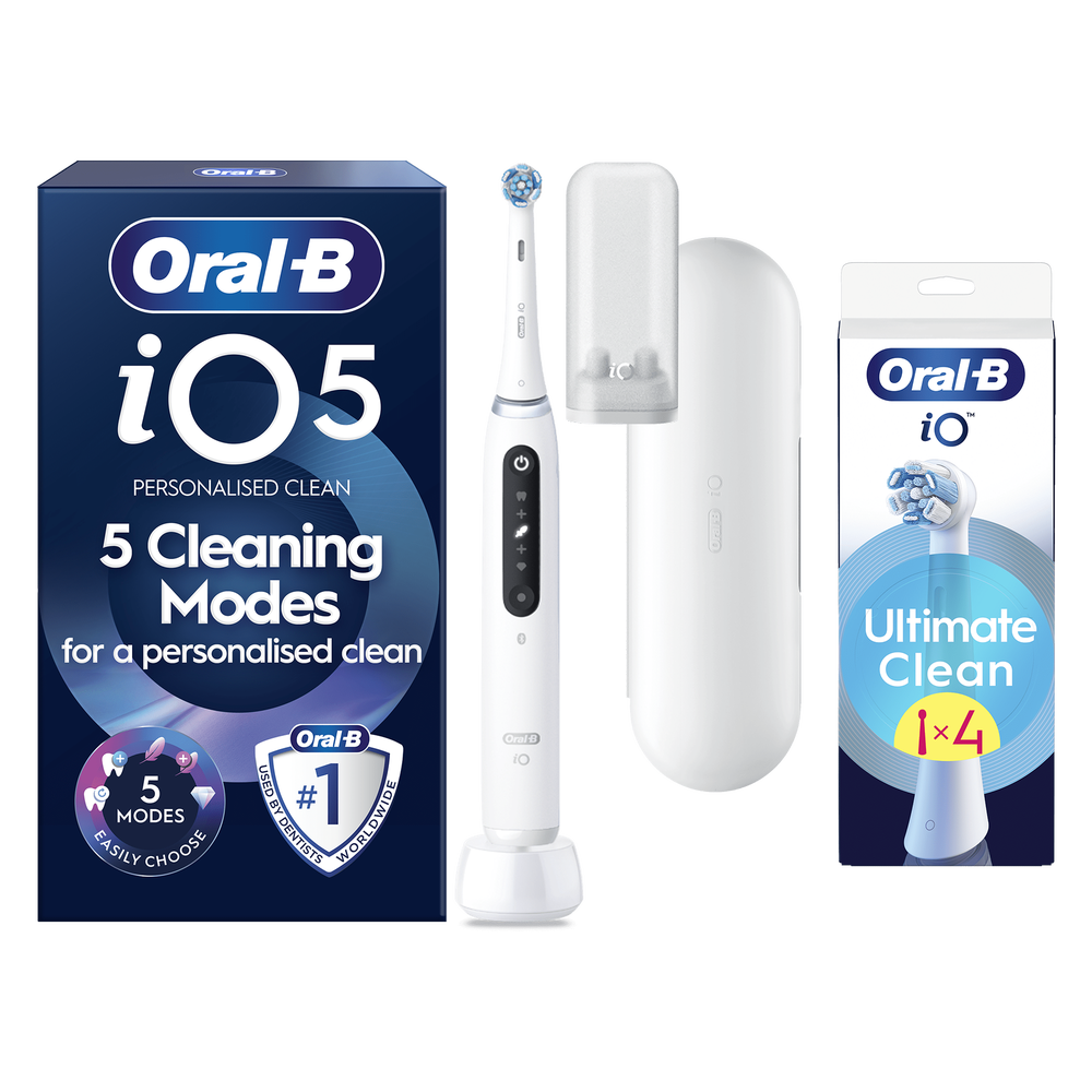 Oral B iO5 White Electric Toothbrush Designed By Braun + 4 Brush Heads