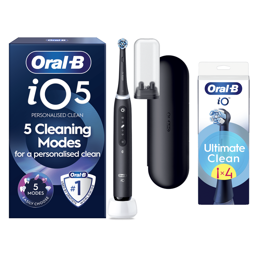 Oral B iO5 Black Electric Toothbrush Designed By Braun + 4 Brush Heads
