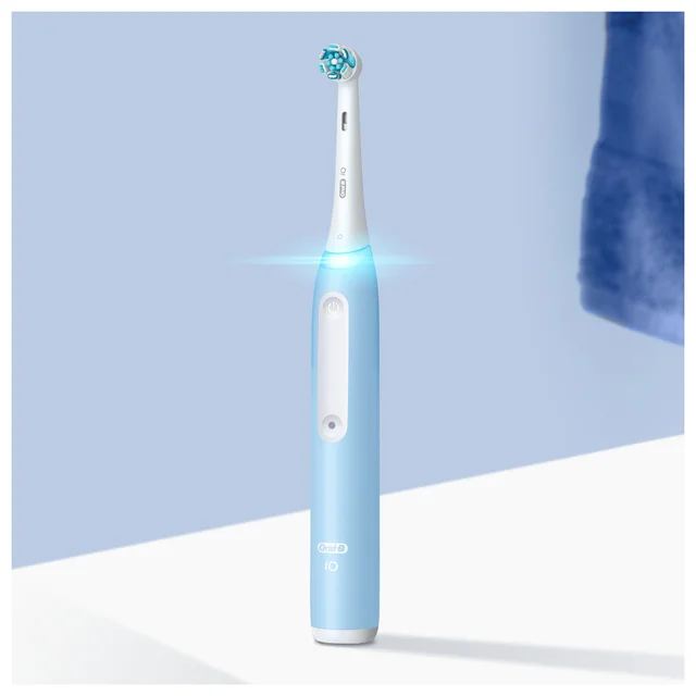 Oral B iO3 Ice Blue Electric Toothbrush + 8 Refills