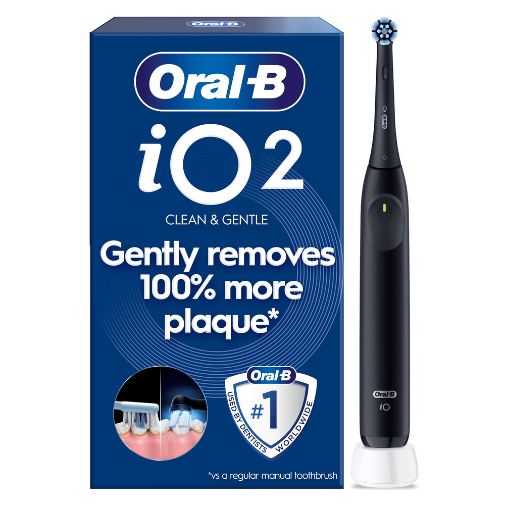 Oral-B iO2 electric toothbrush with packaging, highlighting the claim of gently removing 100% more plaque.
