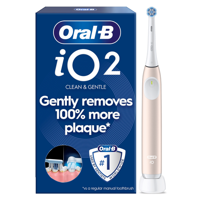 Oral-B iO2 electric toothbrush with packaging, highlighting the claim of gently removing 100% more plaque.