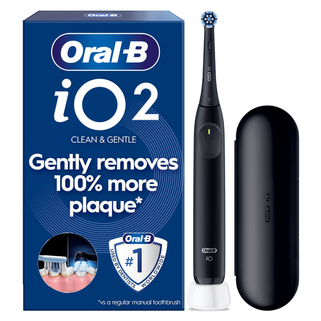 Oral-B iO2 electric toothbrush with packaging, highlighting the claim of gently removing 100% more plaque.