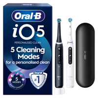 Oral-B iO5 electric toothbrushes, black and white versions, with packaging highlighting 5 Cleaning Modes for a personalised clean.