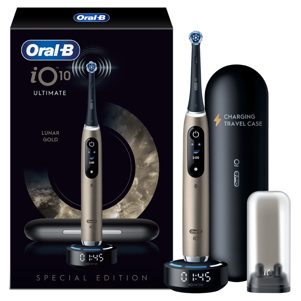 Oral-B iO 10 Ultimate Lunar Gold toothbrush with charging travel case and smart charging base.