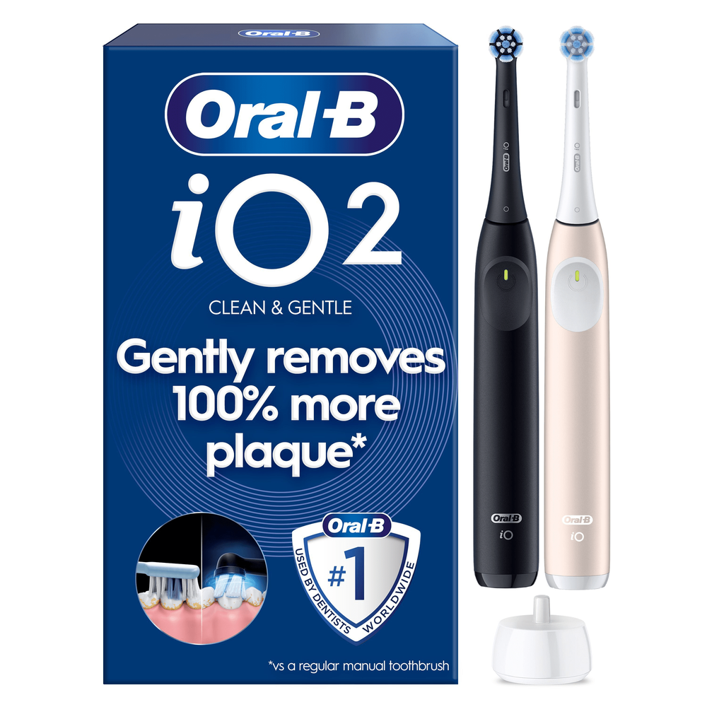Oral-B iO2 electric toothbrush with travel case & packaging, highlights Gently removes 100% more plaque*.
